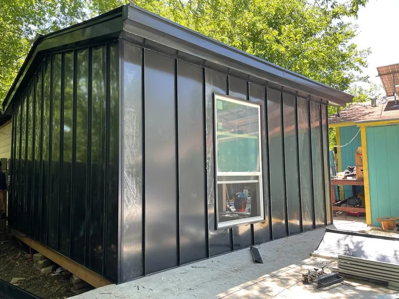 Black standing seam metal wall panels for Roof Inspection in Morehead City