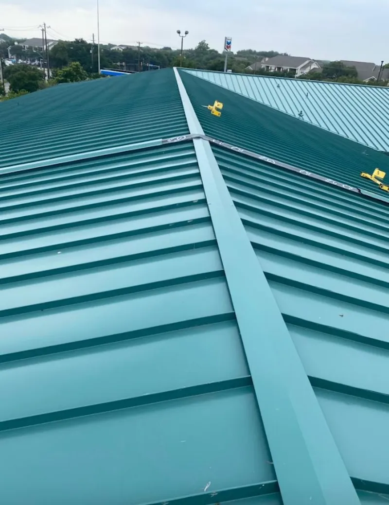 Green commercial metal roof ridge and valley for Metal Roof Repair in Morehead City